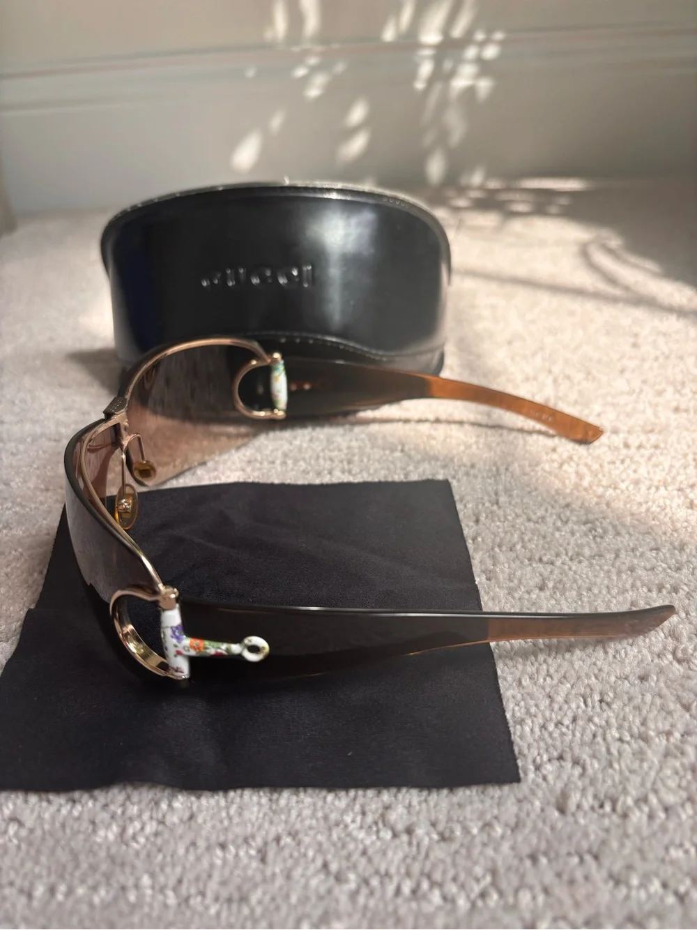 Gucci bold shield